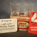 Lot 143 - Vintage Calvert Whiskey Taste Test Kit Advertising Novelty with Two Embossed Shot Glasses, "Whiskey Expert" Certificate Cards, and Instruction Pamphlet in Original Box