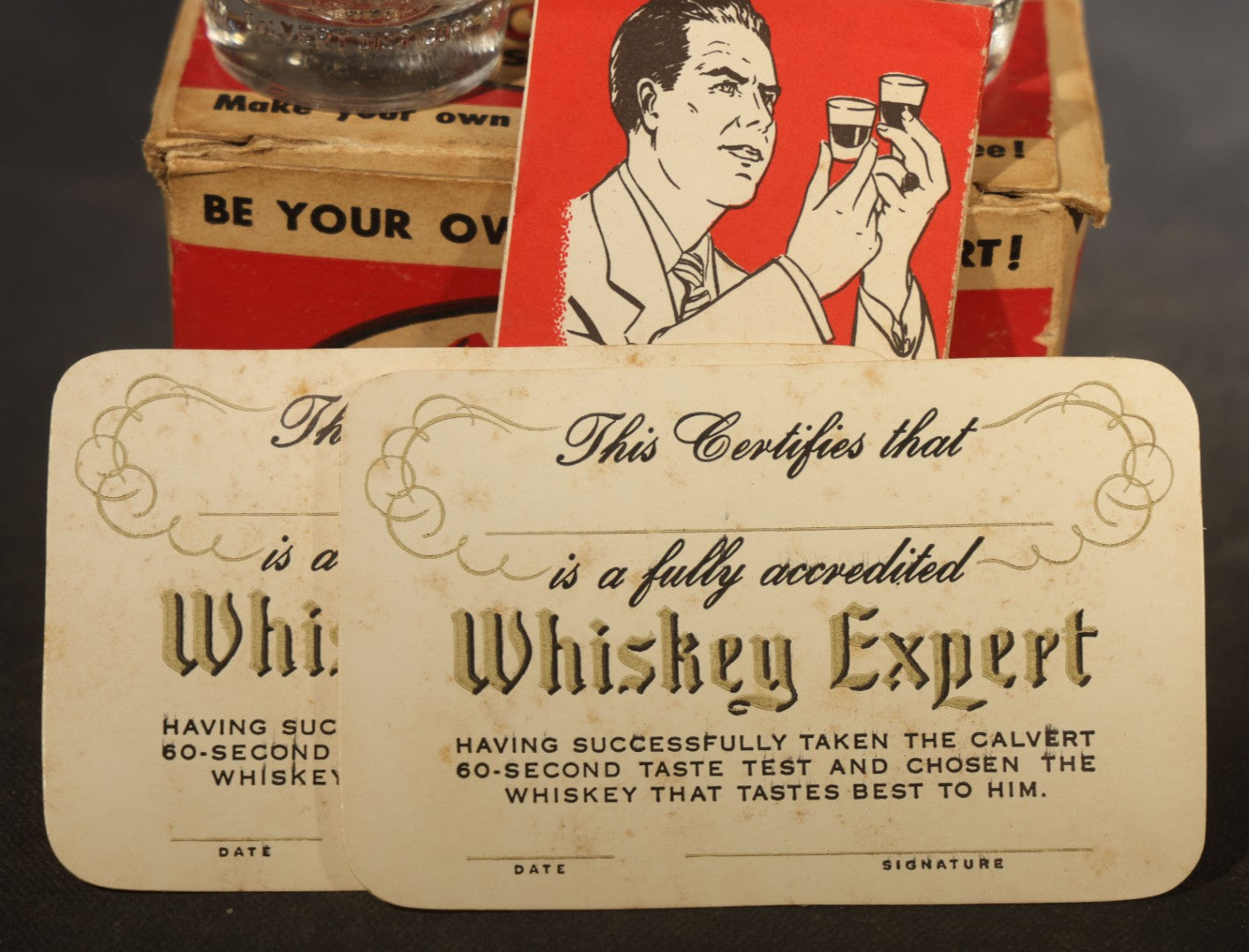 Vintage Calvert Whiskey Taste Test Kit Advertising Novelty with Two Embossed Shot Glasses, "Whiskey Expert" Certificate Cards, and Instruction Pamphlet in Original Box