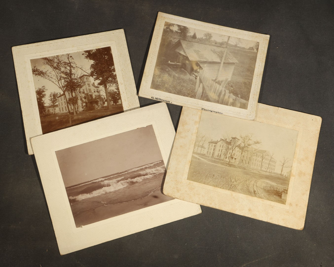 Grouping of Four Antique Board-Mounted Photographs Including Northwestern University Old College, Seminary, Heck Hall, and Lake Michigan