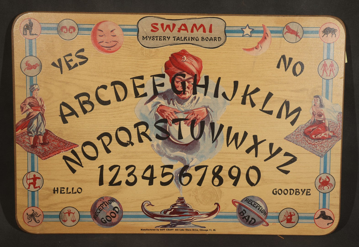 Vintage "Swami Mystery Talking Board" Ouija Board with Partial Original Paper Sleeve, Manufactured by Gift Craft, 666 Lake Shore Drive, Chicago, Illinois