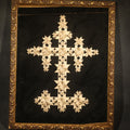 Lot 004 - Antique Victorian Folded Paper Cross on Black Velvet in Modern Gilt Frame, 16-3/8" W x 20-1/4" H