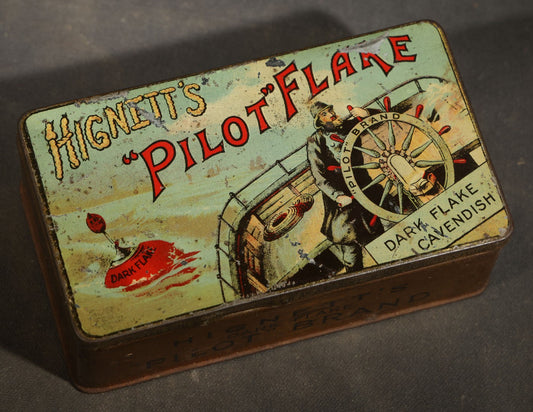 Antique Hignett's "Pilot" Flake Dark Flake Cavendish Tobacco Tin with Ship's Helmsman Graphic