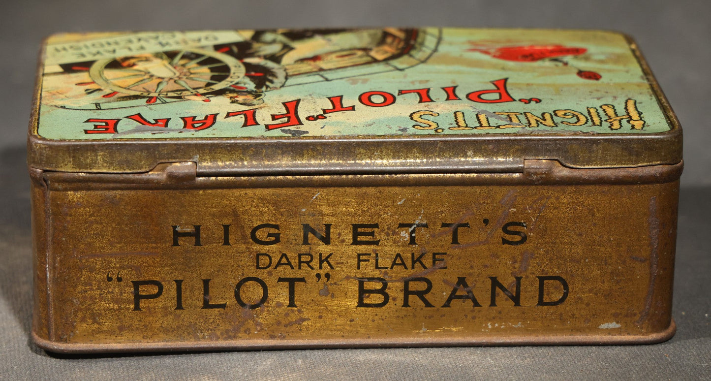 Antique Hignett's "Pilot" Flake Dark Flake Cavendish Tobacco Tin with Ship's Helmsman Graphic