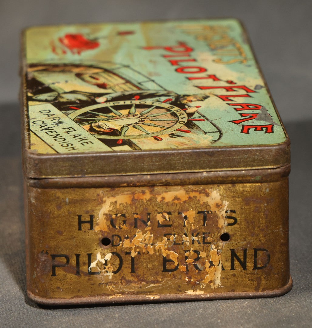 Antique Hignett's "Pilot" Flake Dark Flake Cavendish Tobacco Tin with Ship's Helmsman Graphic