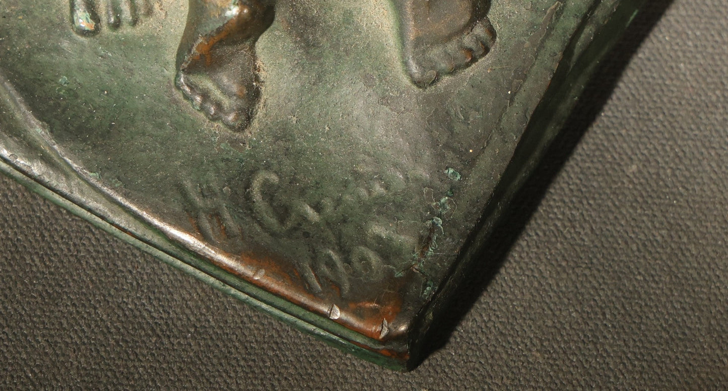 Pair of Antique Green-Patinated Bookends with Two Putti / Cherubs in Relief, Signed and Dated 1903, Manufactured by WAL Co.