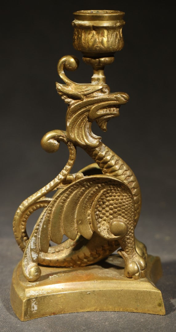 Pair of Antique Brass Figural Dragon or Griffin Candlesticks with Foliate Candle Cups on Shaped Bases
