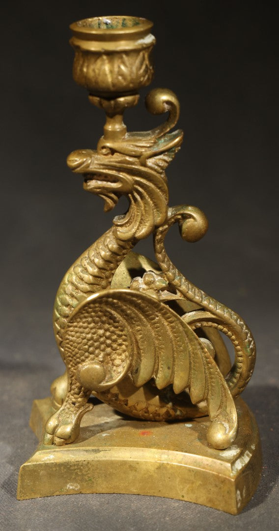 Pair of Antique Brass Figural Dragon or Griffin Candlesticks with Foliate Candle Cups on Shaped Bases