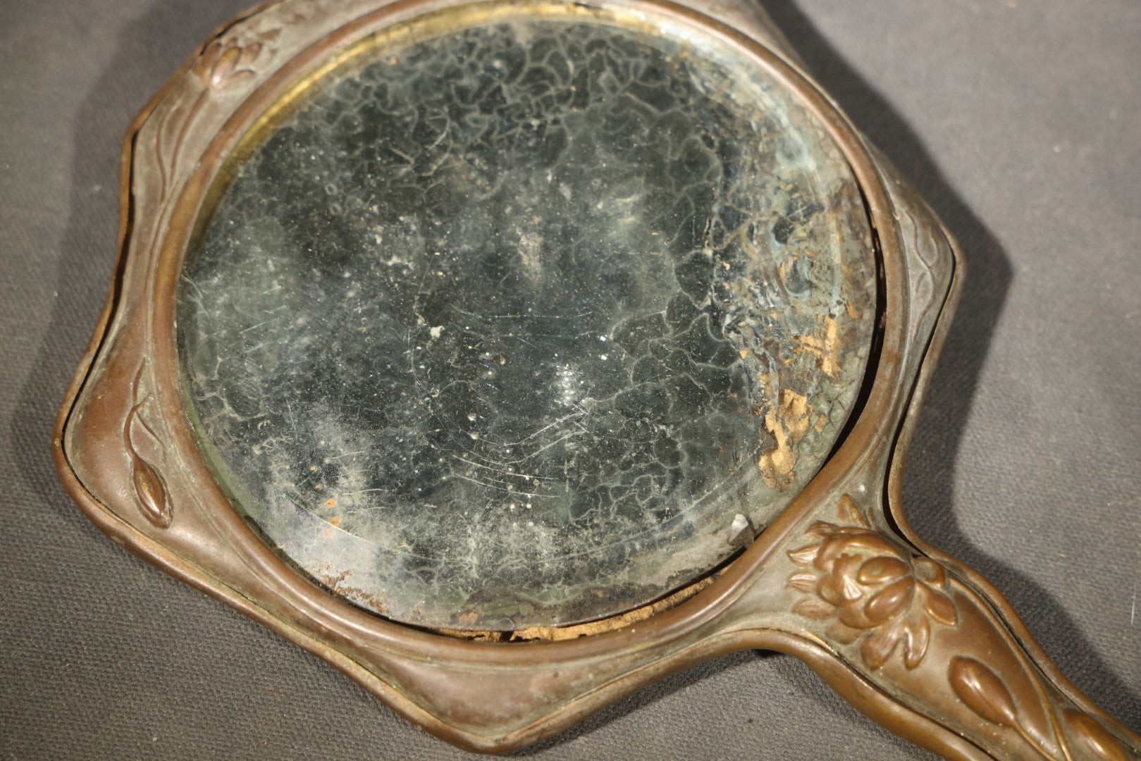 Antique Art Nouveau Repoussé Copper Hand Mirror with Woman and Water Lily Motif, note Mirror in Poor Condition