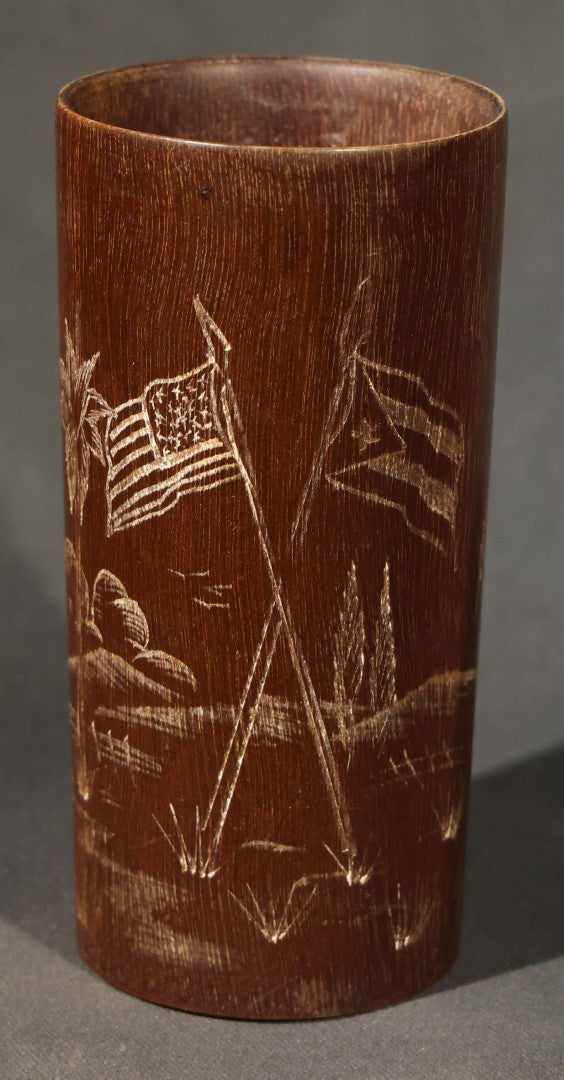 Grouping of Three Antique and Vintage Folk Art Pieces including Bamboo Cup with Crossed American and Cuban Flags, Red Painted Wooden Fish Line Winder, and "Whoopee" Man in Top Hat Figure