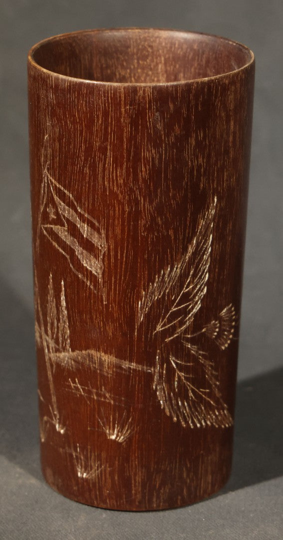 Grouping of Three Antique and Vintage Folk Art Pieces including Bamboo Cup with Crossed American and Cuban Flags, Red Painted Wooden Fish Line Winder, and "Whoopee" Man in Top Hat Figure