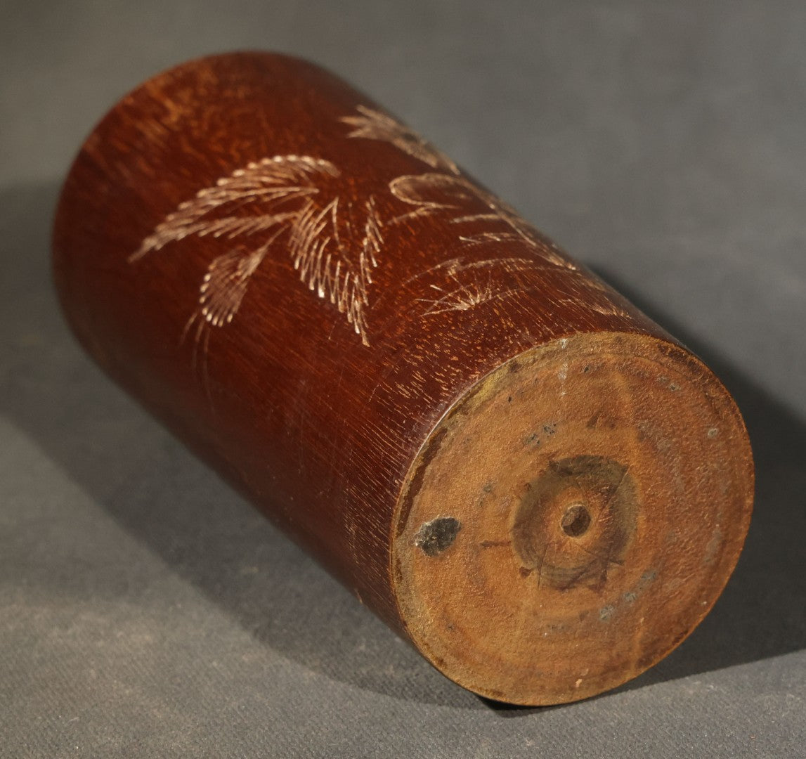 Grouping of Three Antique and Vintage Folk Art Pieces including Bamboo Cup with Crossed American and Cuban Flags, Red Painted Wooden Fish Line Winder, and "Whoopee" Man in Top Hat Figure