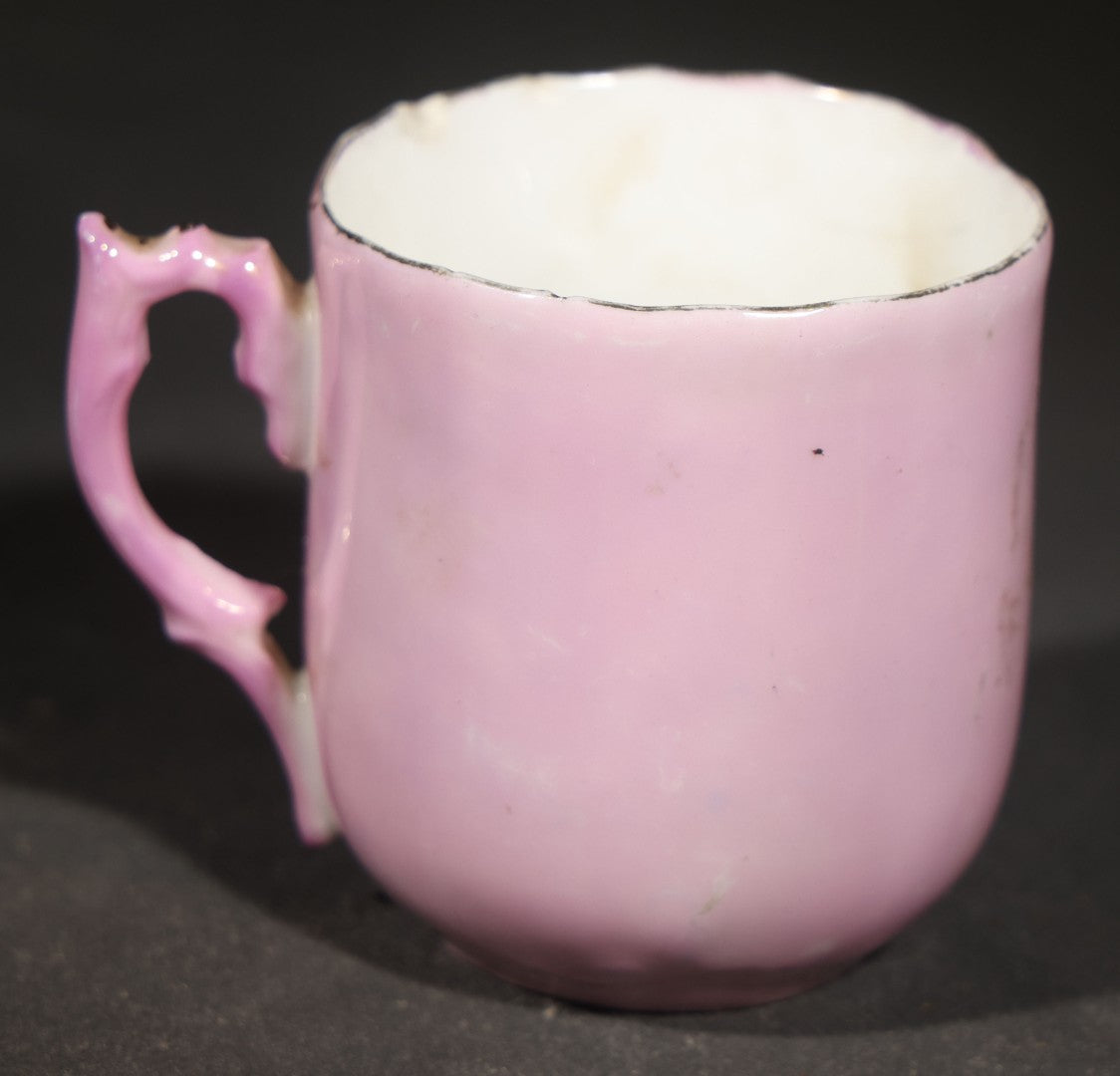 Antique German Pink Porcelain Demitasse Cup and Saucer with Anthropomorphic Cats in a Rowboat, Note Chip to Handle