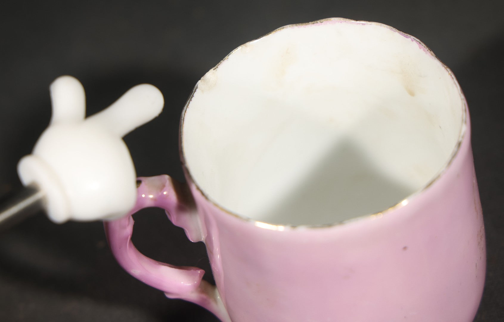 Antique German Pink Porcelain Demitasse Cup and Saucer with Anthropomorphic Cats in a Rowboat, Note Chip to Handle