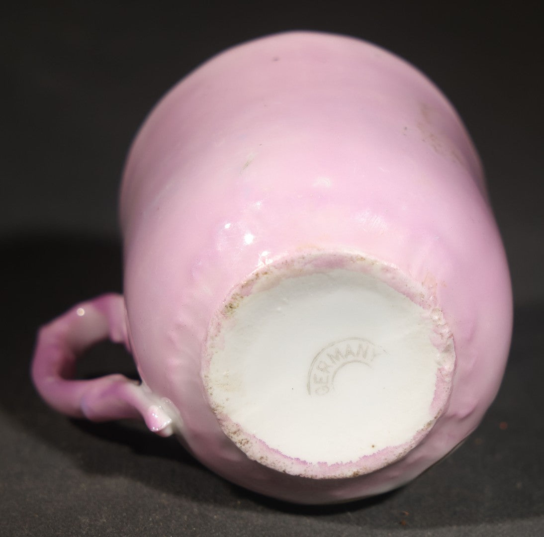 Antique German Pink Porcelain Demitasse Cup and Saucer with Anthropomorphic Cats in a Rowboat, Note Chip to Handle