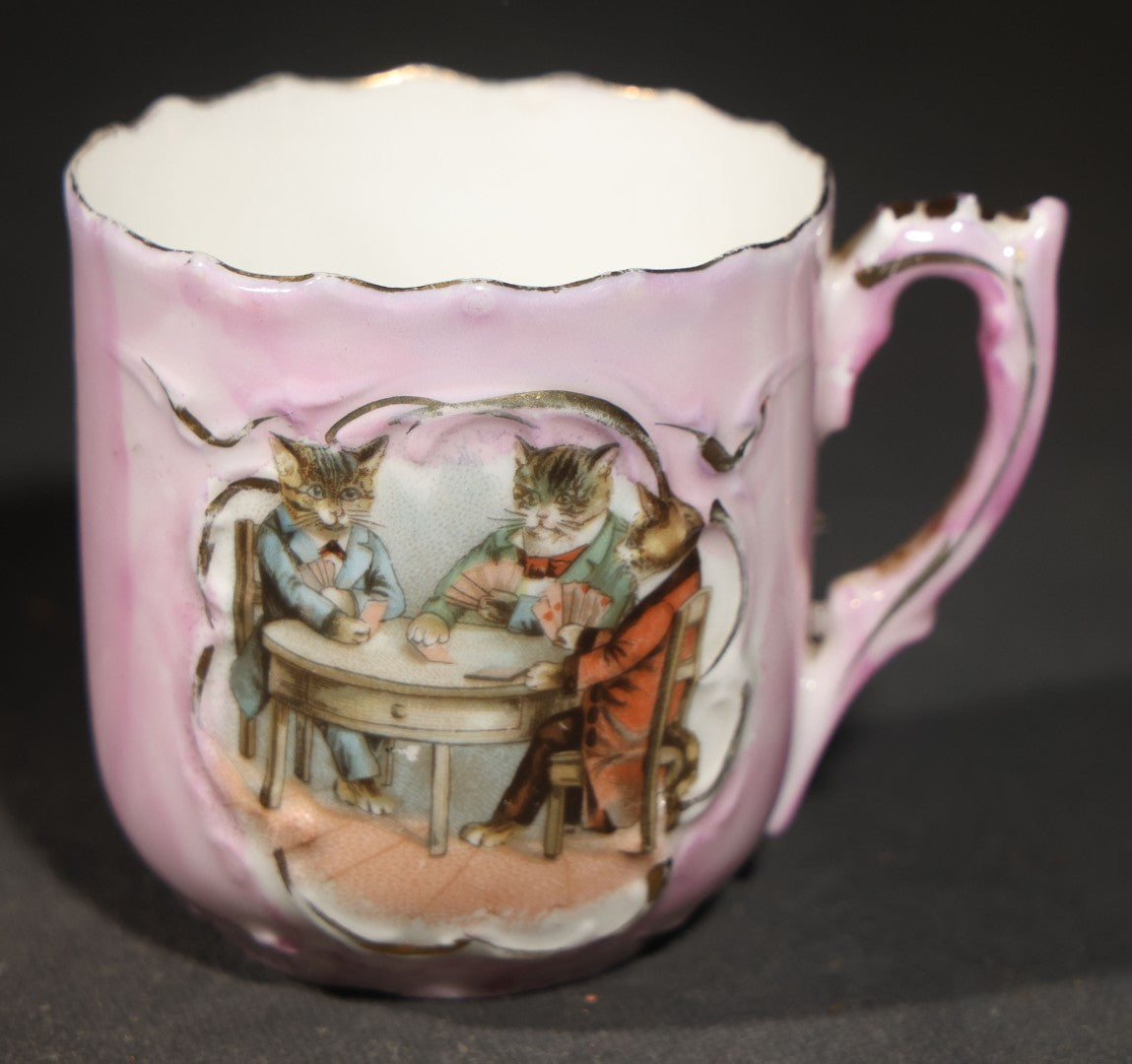 Antique German Pink Porcelain Demitasse Cup and Saucer with Anthropomorphic Cats Playing Cards, Note Chip to Handle