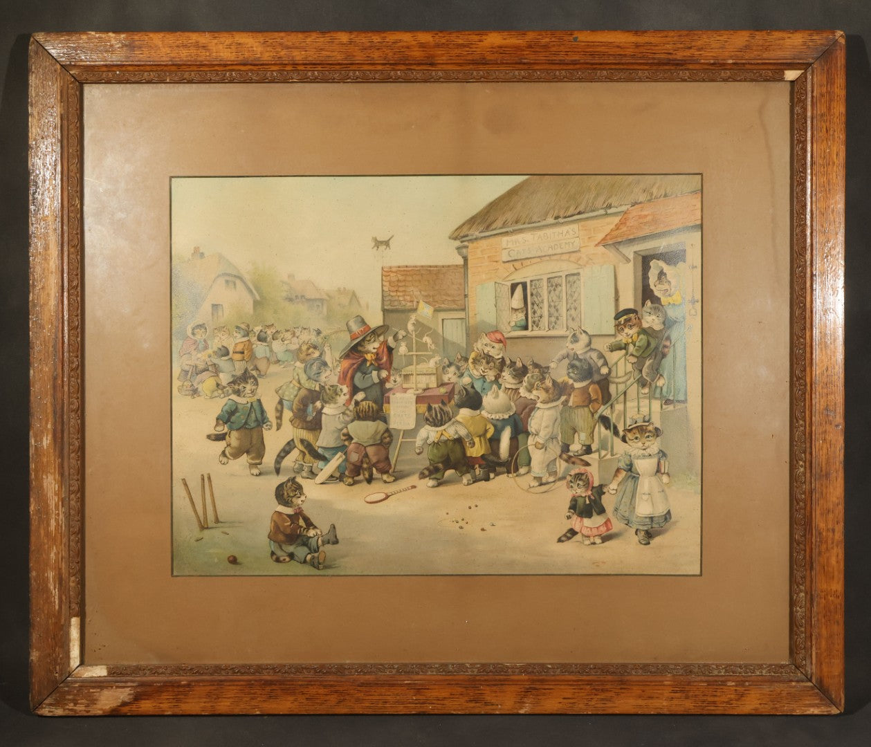Antique Framed Louis Wain Chromolithograph Print, "Mrs. Tabitha's Cats Academy" with Anthropomorphic Cats Children Watching Performing Mice Show