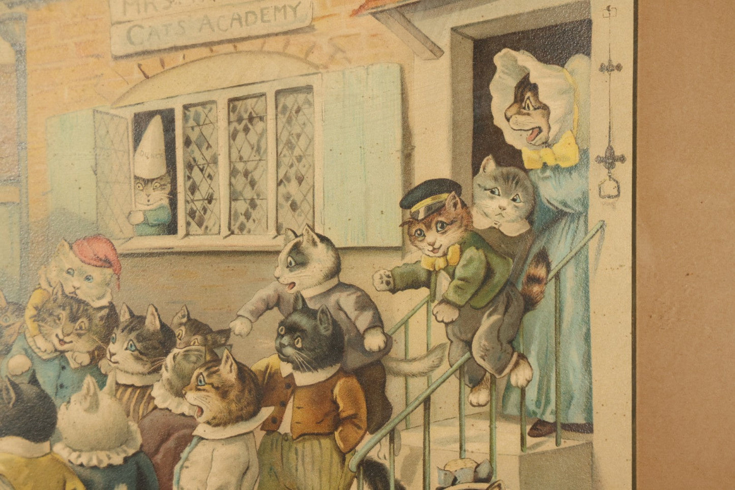 Antique Framed Louis Wain Chromolithograph Print, "Mrs. Tabitha's Cats Academy" with Anthropomorphic Cats Children Watching Performing Mice Show