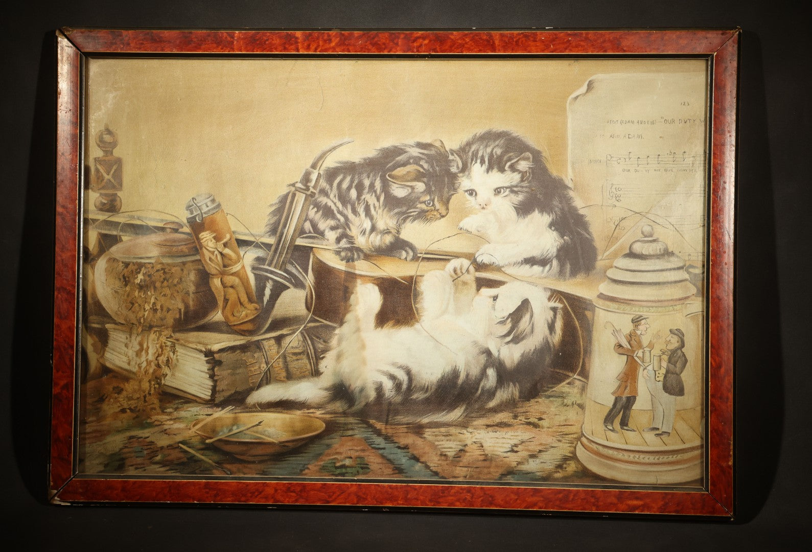 Antique Framed Chromolithograph Print of Three Cats Playing with a Violin, With Sheet Music, Books, and Stein In Scene