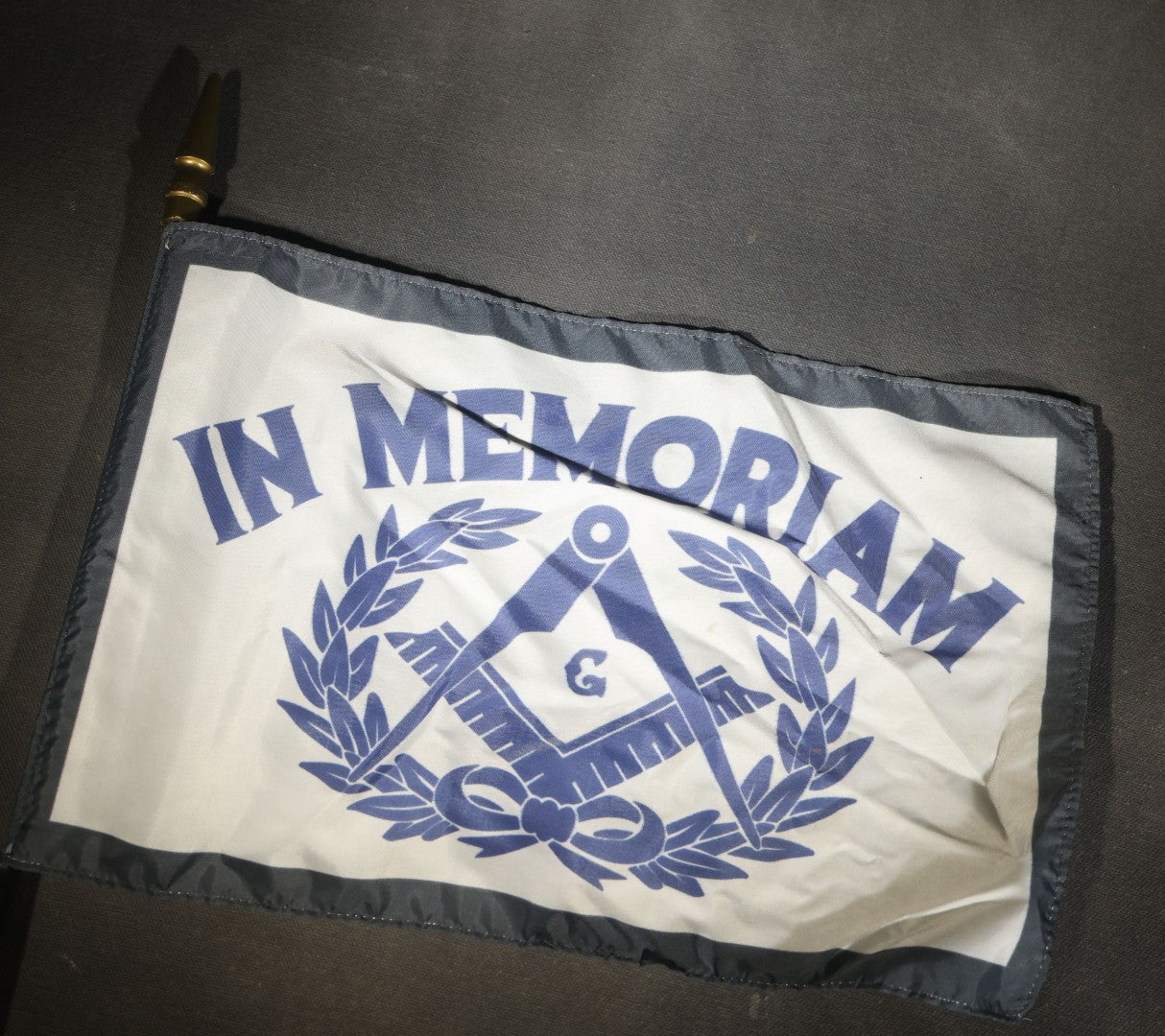 Trio of Modern Masonic "In Memoriam" Flags with Square and Compass and Laurel Wreath Design on Staffs