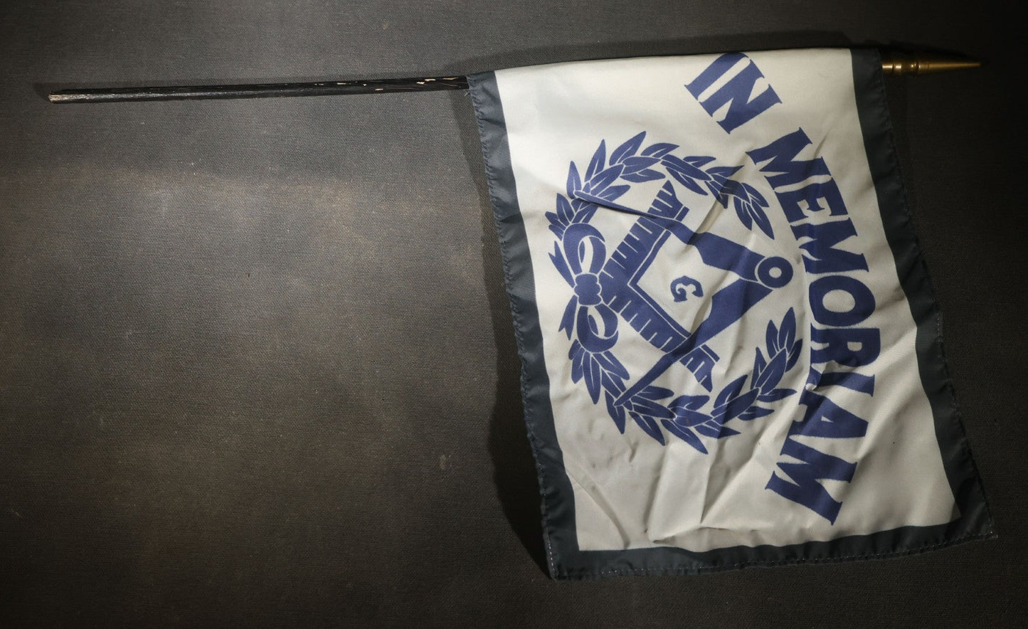 Trio of Modern Masonic "In Memoriam" Flags with Square and Compass and Laurel Wreath Design on Staffs