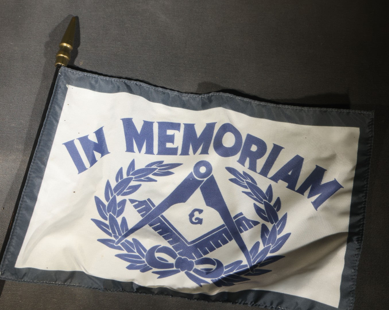Trio of Modern Masonic "In Memoriam" Flags with Square and Compass and Laurel Wreath Design on Staffs