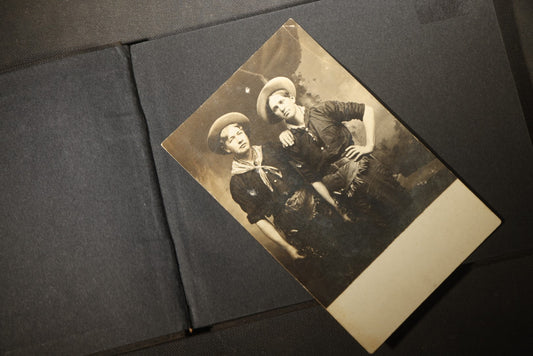 Antique Snapshot Photo Album Containing 25+ Photographs, Circa 1910, Including Beach Scenes, R.P.P.C. of Two Young Men in Cowboy Attire, Sailboat, Swans, Castle Architecture, and Family Portraits