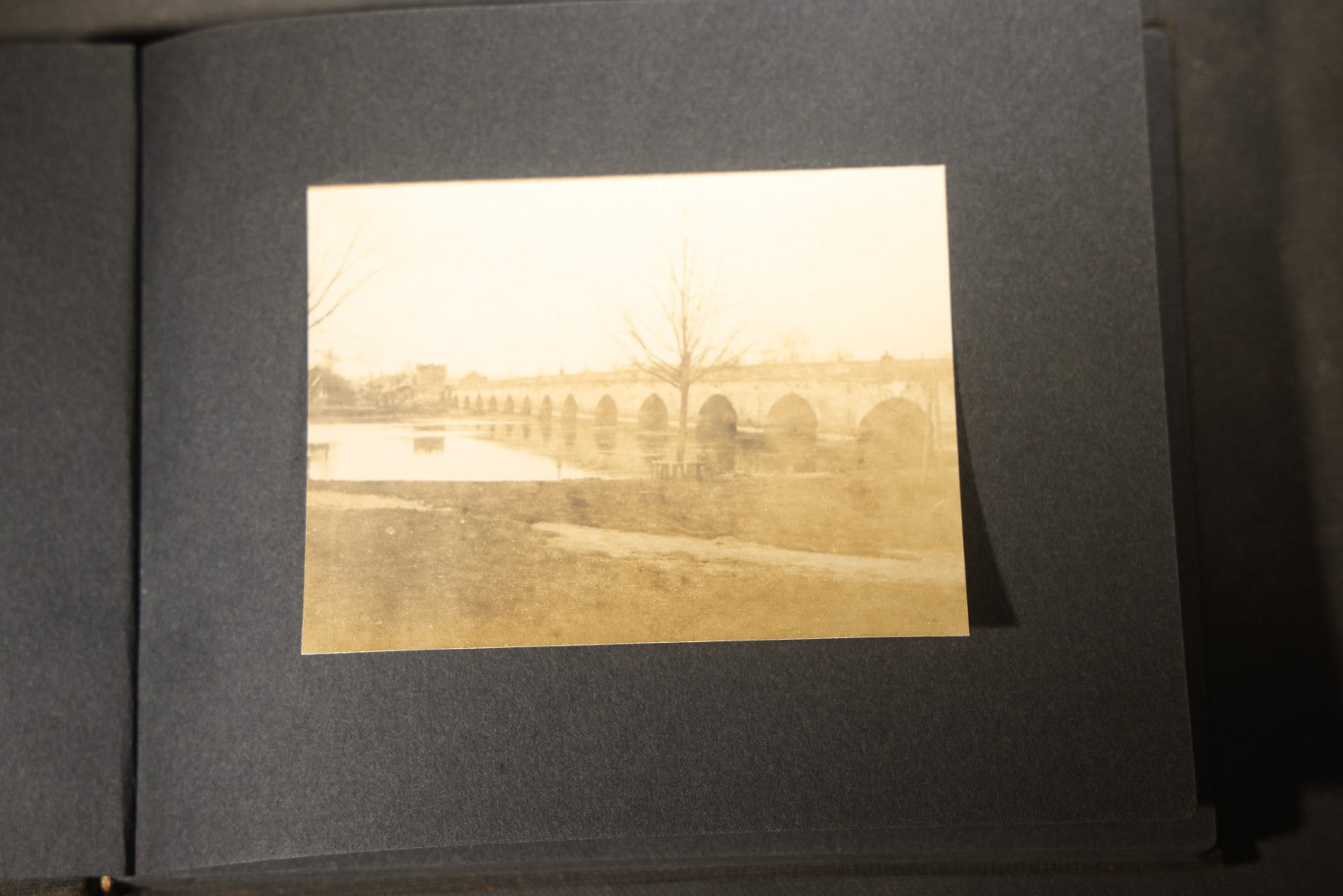 Antique Snapshot Photo Album Containing 25+ Photographs, Circa 1910, Including Beach Scenes, R.P.P.C. of Two Young Men in Cowboy Attire, Sailboat, Swans, Castle Architecture, and Family Portraits