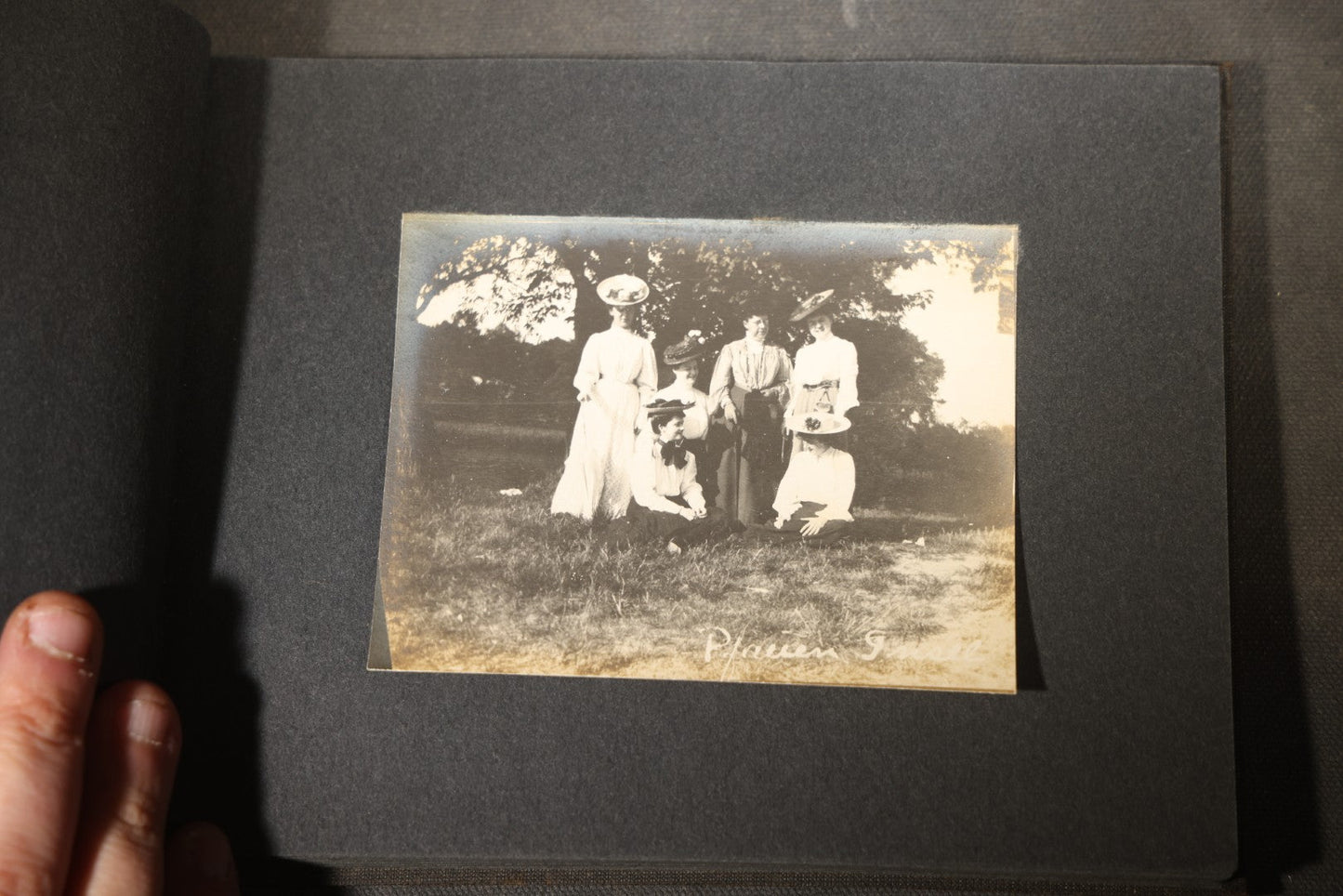 Antique Snapshot Photo Album Containing 25+ Photographs, Circa 1910, Including Beach Scenes, R.P.P.C. of Two Young Men in Cowboy Attire, Sailboat, Swans, Castle Architecture, and Family Portraits
