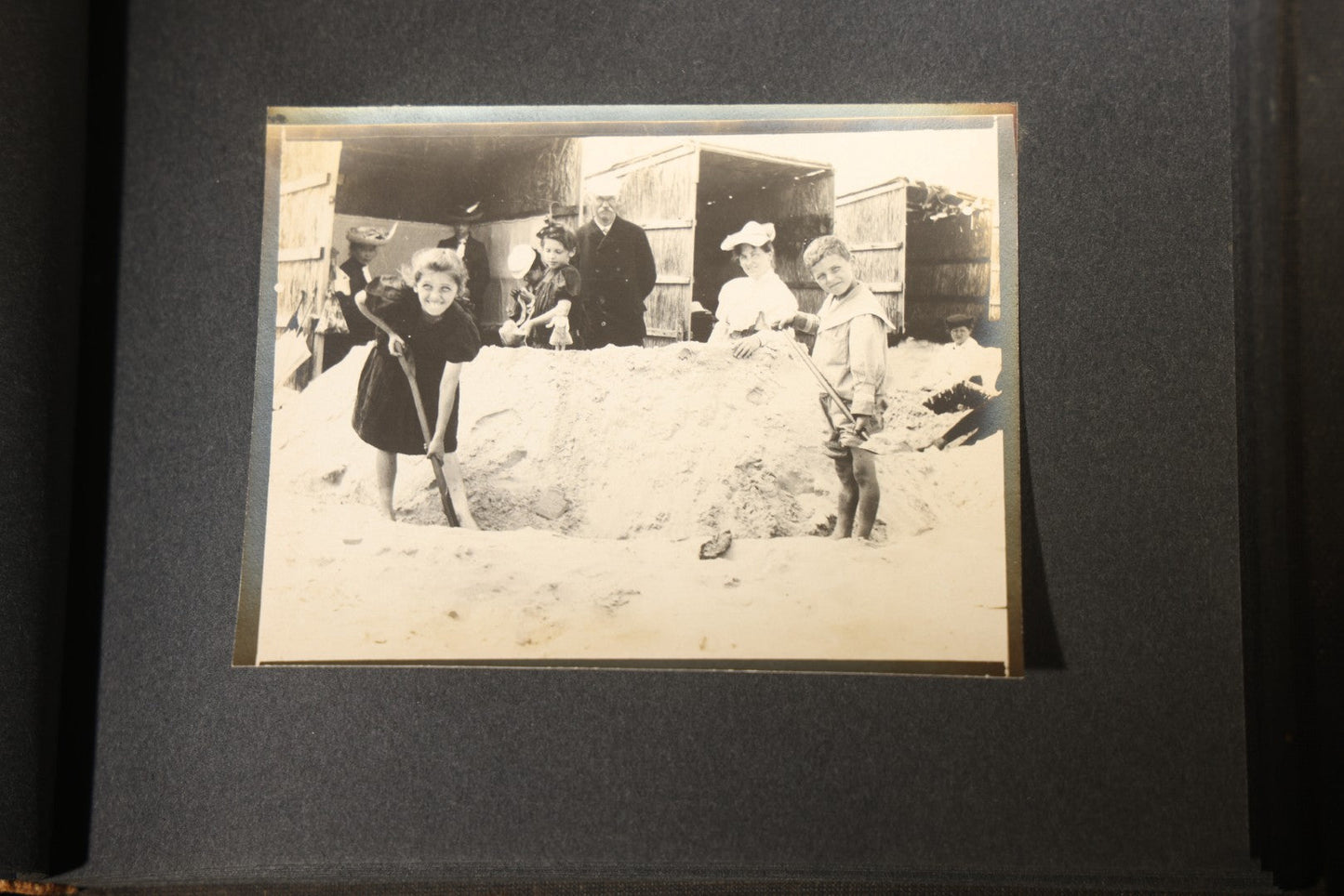 Antique Snapshot Photo Album Containing 25+ Photographs, Circa 1910, Including Beach Scenes, R.P.P.C. of Two Young Men in Cowboy Attire, Sailboat, Swans, Castle Architecture, and Family Portraits