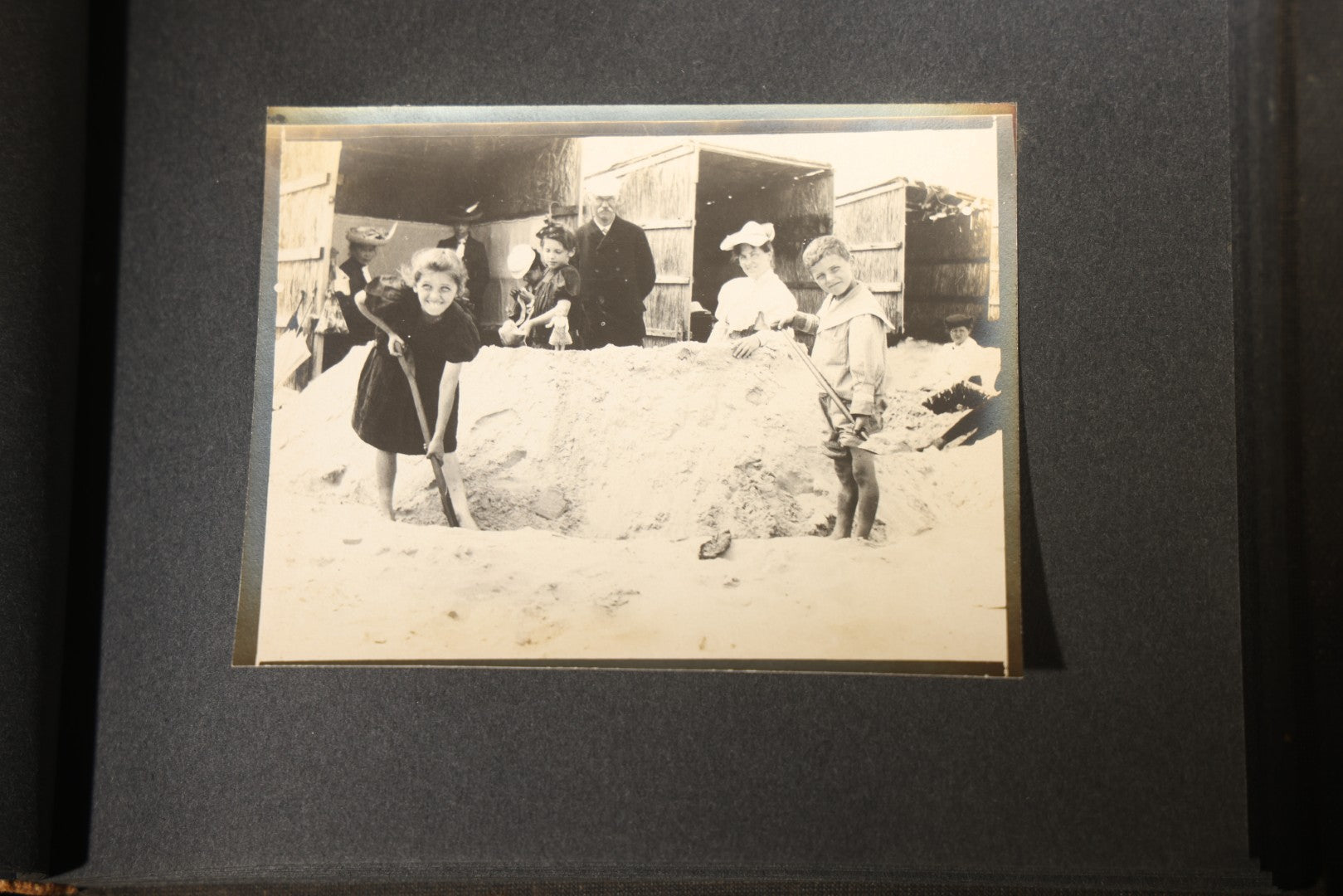 Antique Snapshot Photo Album Containing 25+ Photographs, Circa 1910, Including Beach Scenes, R.P.P.C. of Two Young Men in Cowboy Attire, Sailboat, Swans, Castle Architecture, and Family Portraits