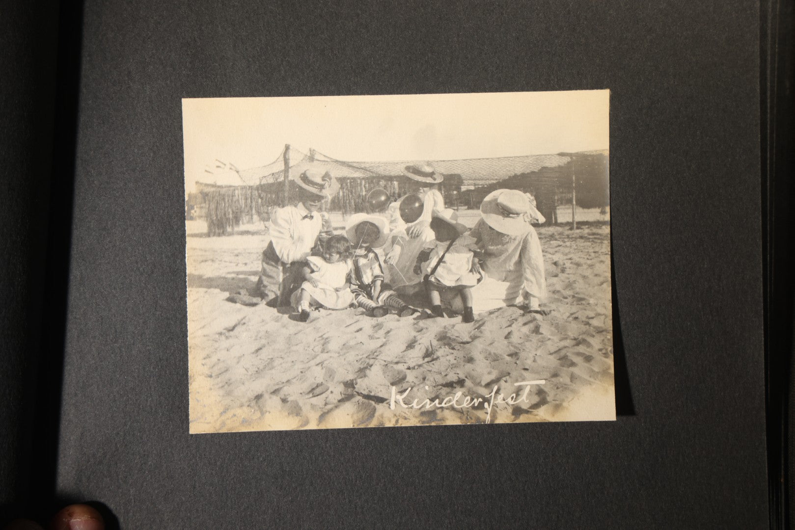 Antique Snapshot Photo Album Containing 25+ Photographs, Circa 1910, Including Beach Scenes, R.P.P.C. of Two Young Men in Cowboy Attire, Sailboat, Swans, Castle Architecture, and Family Portraits