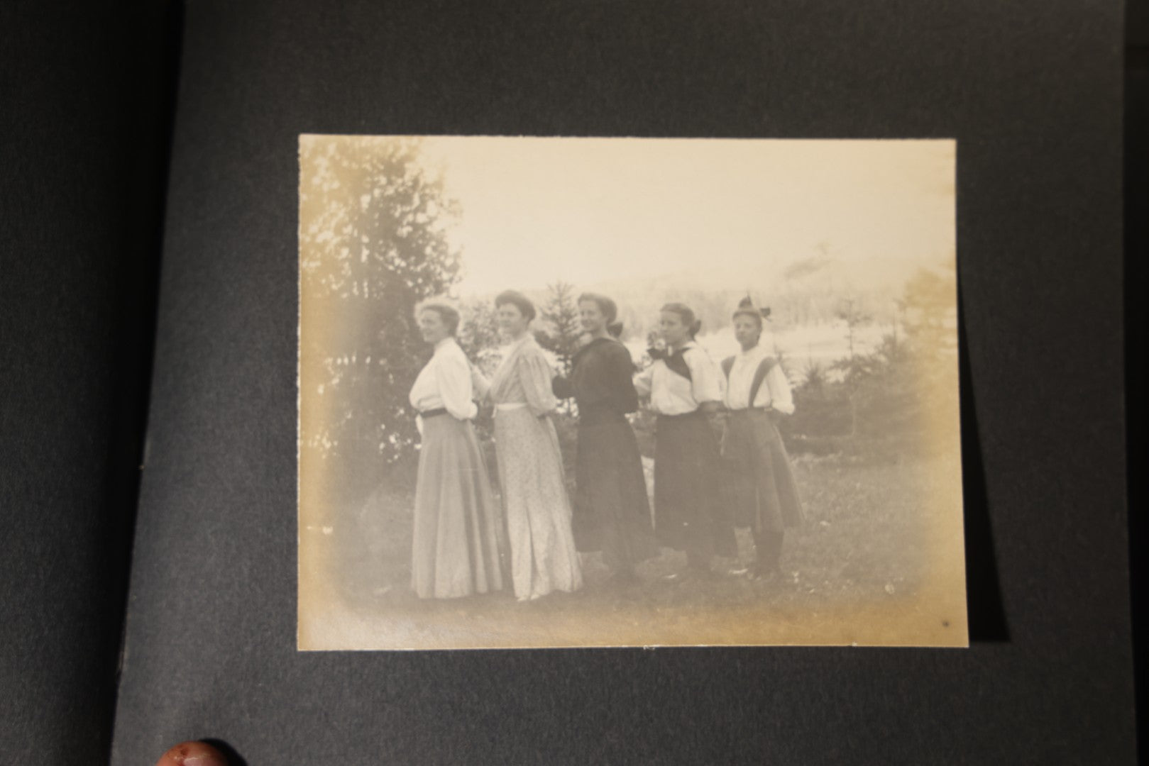 Antique Snapshot Photo Album Containing 25+ Photographs, Circa 1910, Including Beach Scenes, R.P.P.C. of Two Young Men in Cowboy Attire, Sailboat, Swans, Castle Architecture, and Family Portraits