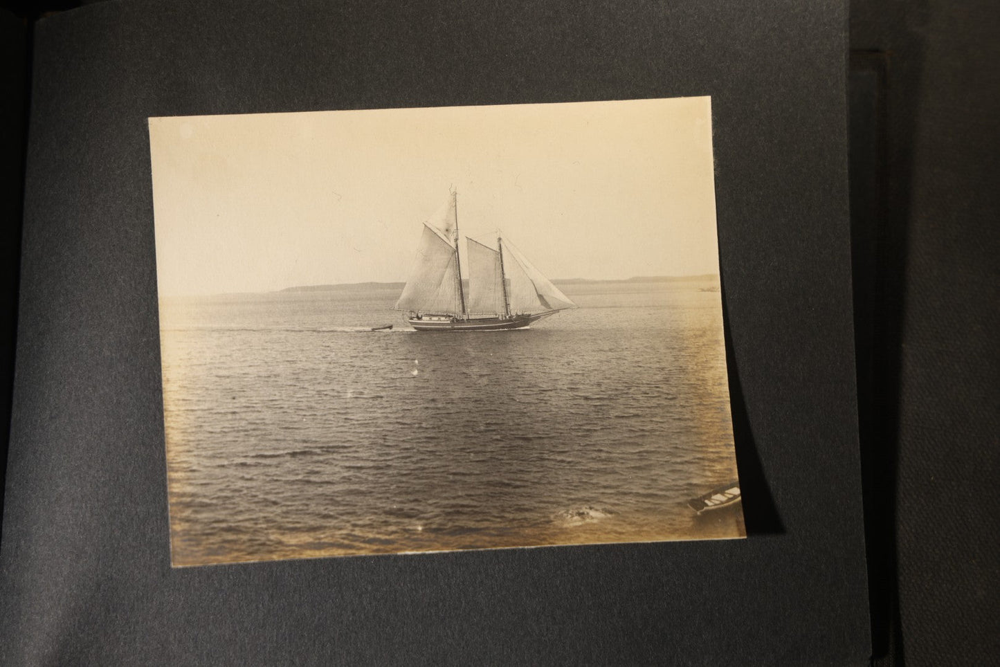 Antique Snapshot Photo Album Containing 25+ Photographs, Circa 1910, Including Beach Scenes, R.P.P.C. of Two Young Men in Cowboy Attire, Sailboat, Swans, Castle Architecture, and Family Portraits