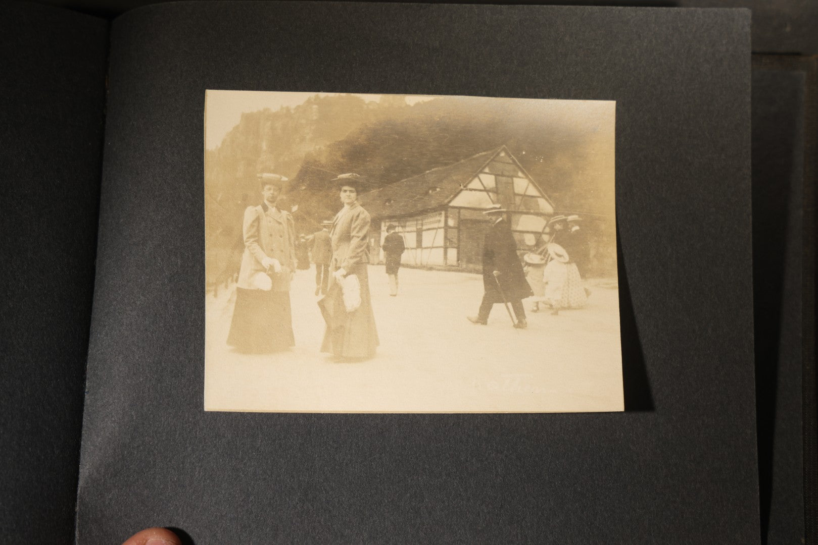 Antique Snapshot Photo Album Containing 25+ Photographs, Circa 1910, Including Beach Scenes, R.P.P.C. of Two Young Men in Cowboy Attire, Sailboat, Swans, Castle Architecture, and Family Portraits