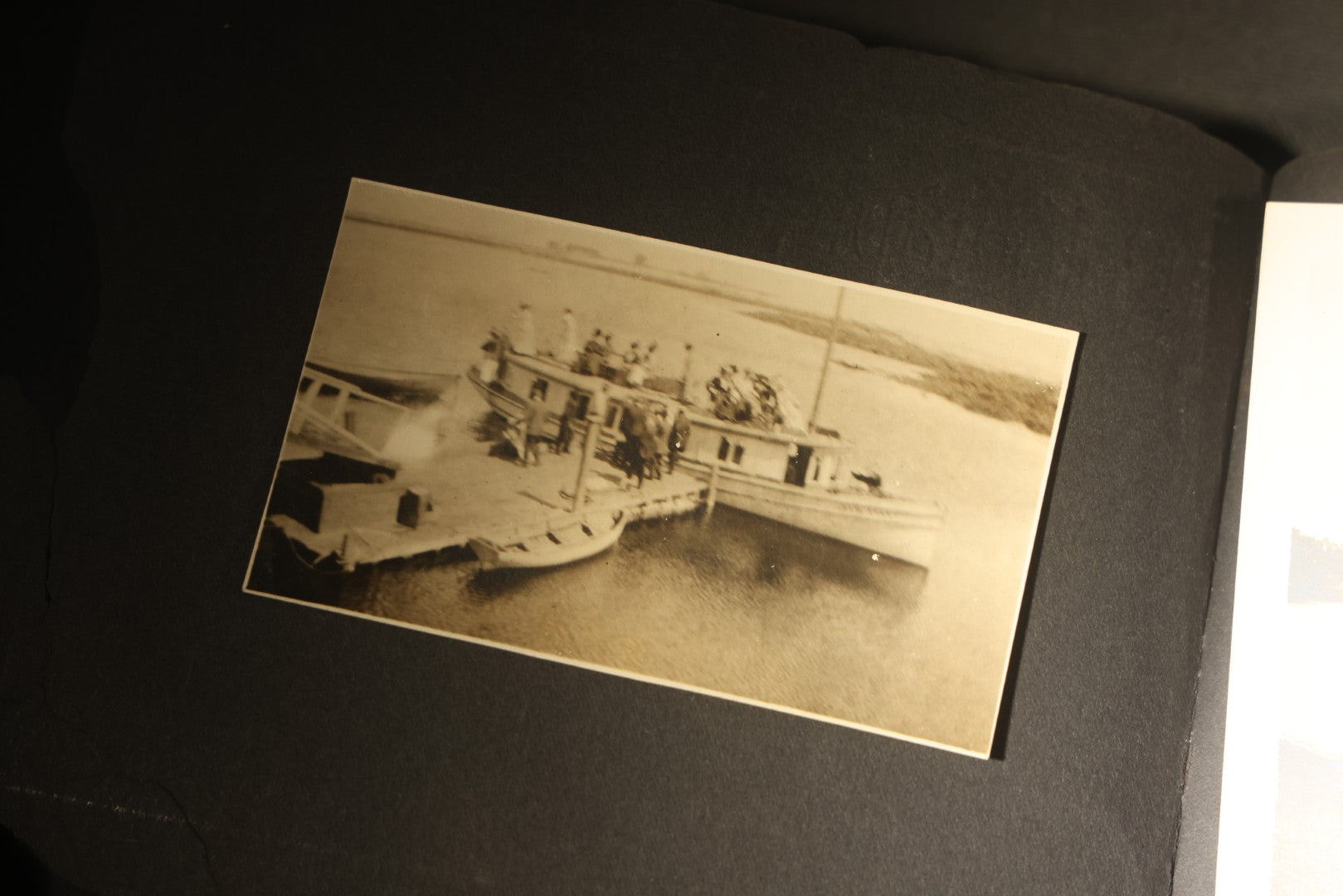 Antique Snapshot Photo Album Containing 30+ Photographs, Circa 1910s-1920s, including Lake and Boating Scenes, Steamboat at Dock, Women Fishing, Swimming, Woman with Dog, and Child with Flag-Decorated Automobile