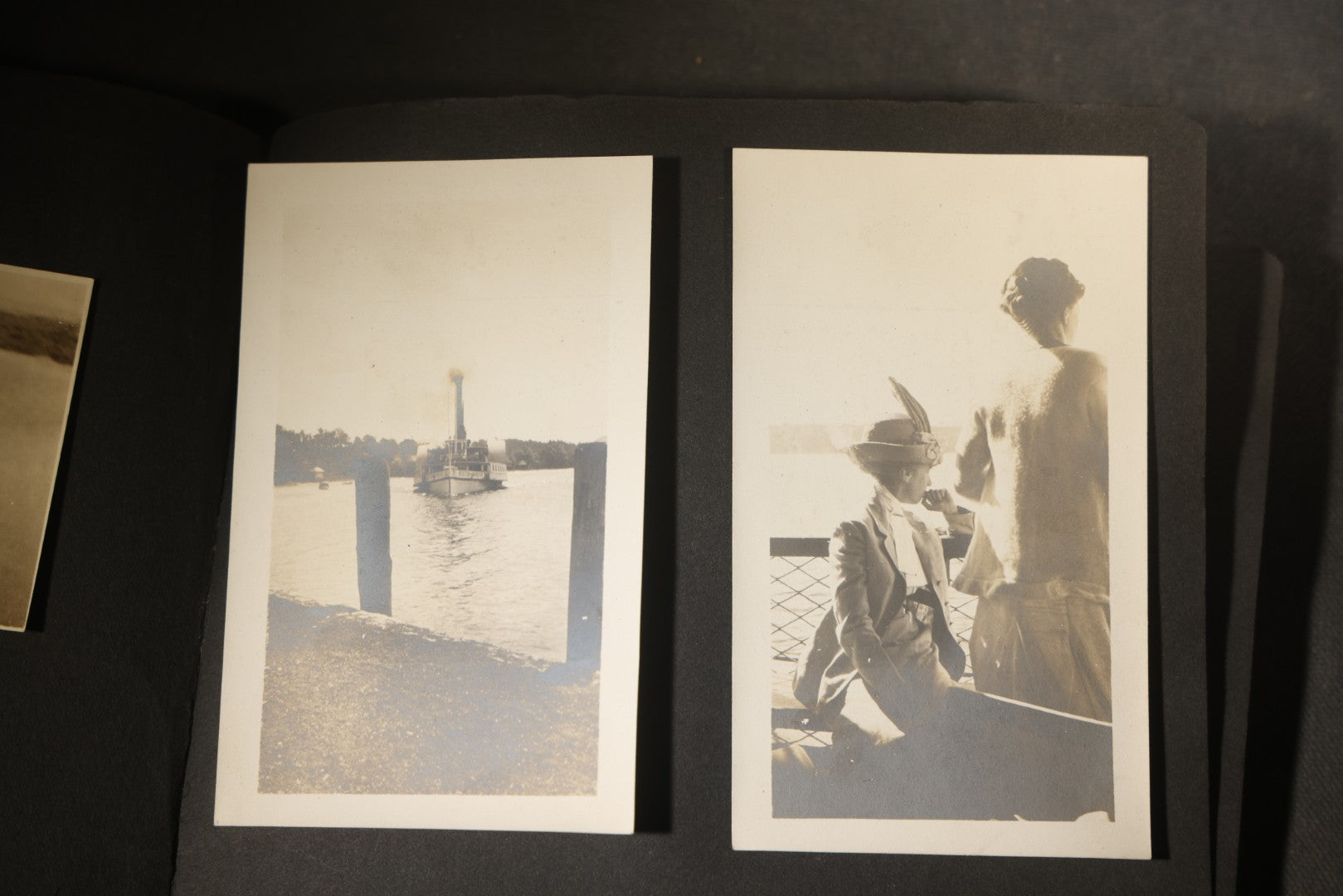 Antique Snapshot Photo Album Containing 30+ Photographs, Circa 1910s-1920s, including Lake and Boating Scenes, Steamboat at Dock, Women Fishing, Swimming, Woman with Dog, and Child with Flag-Decorated Automobile