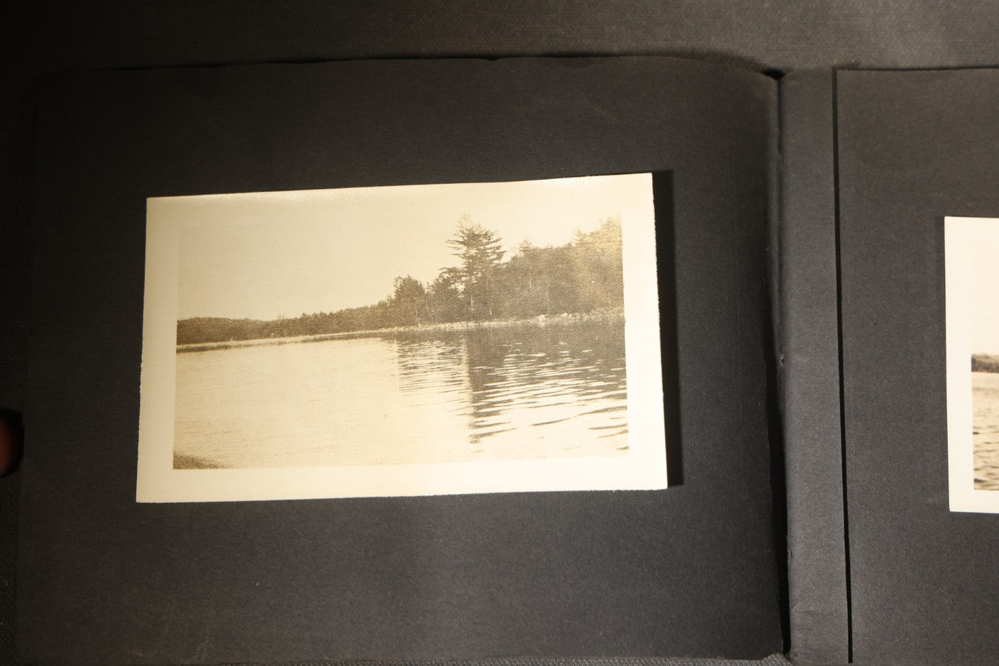 Antique Snapshot Photo Album Containing 30+ Photographs, Circa 1910s-1920s, including Lake and Boating Scenes, Steamboat at Dock, Women Fishing, Swimming, Woman with Dog, and Child with Flag-Decorated Automobile