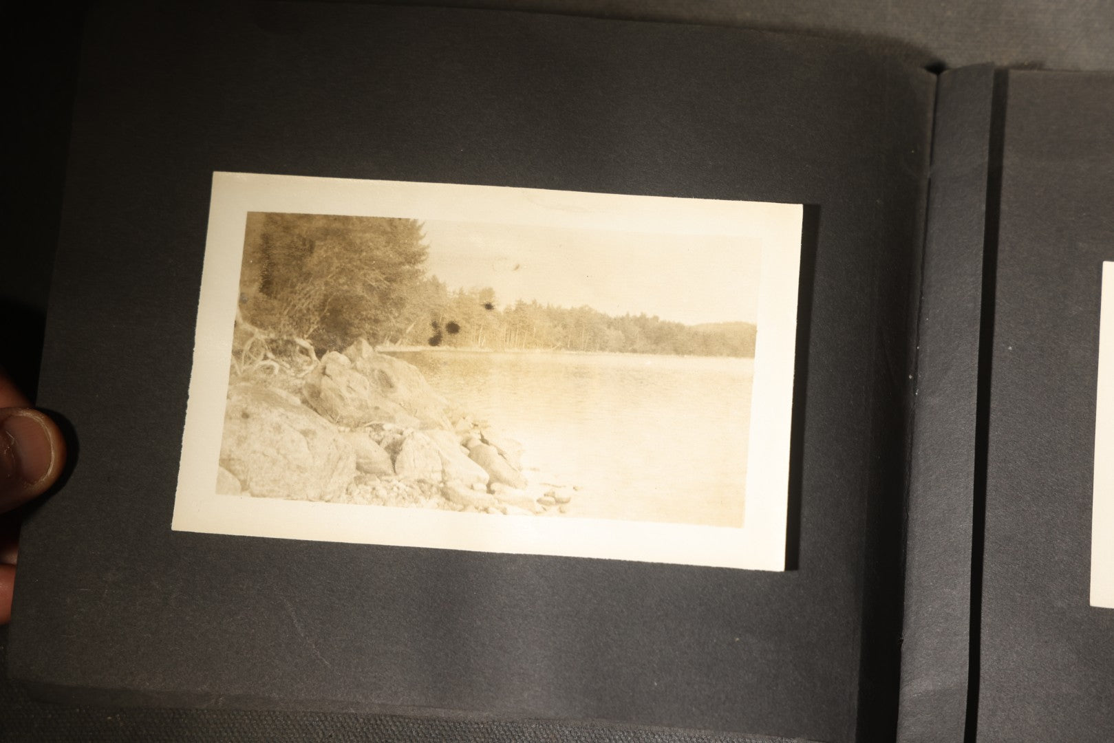 Antique Snapshot Photo Album Containing 30+ Photographs, Circa 1910s-1920s, including Lake and Boating Scenes, Steamboat at Dock, Women Fishing, Swimming, Woman with Dog, and Child with Flag-Decorated Automobile