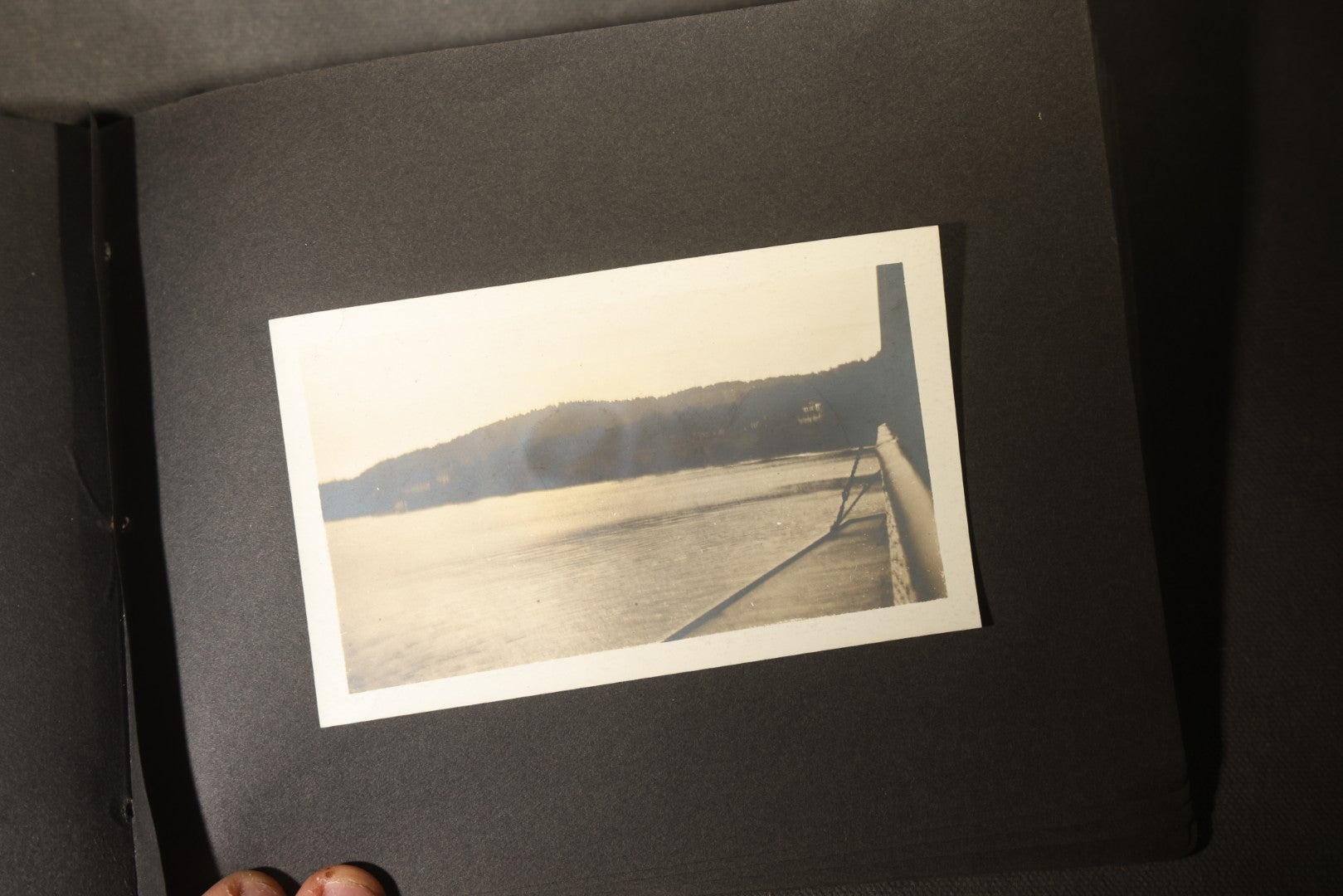 Antique Snapshot Photo Album Containing 30+ Photographs, Circa 1910s-1920s, including Lake and Boating Scenes, Steamboat at Dock, Women Fishing, Swimming, Woman with Dog, and Child with Flag-Decorated Automobile