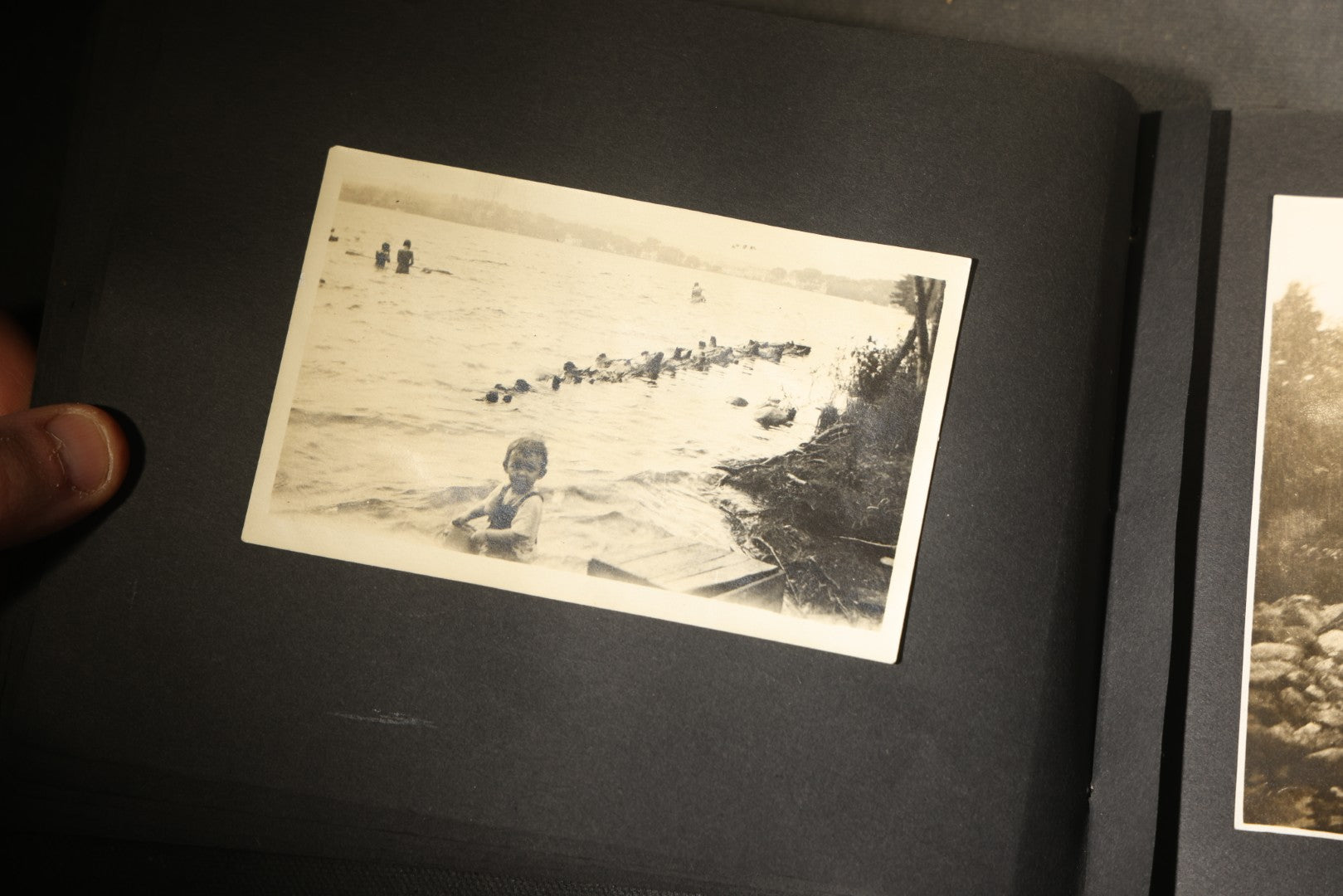 Antique Snapshot Photo Album Containing 30+ Photographs, Circa 1910s-1920s, including Lake and Boating Scenes, Steamboat at Dock, Women Fishing, Swimming, Woman with Dog, and Child with Flag-Decorated Automobile