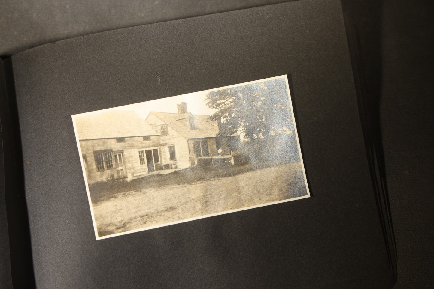 Antique Snapshot Photo Album Containing 30+ Photographs, Circa 1910s-1920s, including Lake and Boating Scenes, Steamboat at Dock, Women Fishing, Swimming, Woman with Dog, and Child with Flag-Decorated Automobile