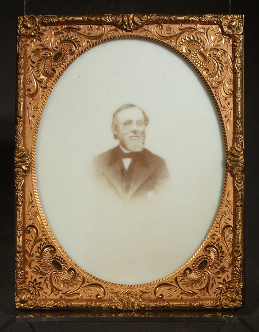 Antique Half-Plate Opalotype Photograph of a Bearded Elderly Man in Suit and Bow Tie with Embossed Brass Mat and Preserver