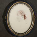 Lot 085 - Antique 1/6th Plate Opalotype Photograph of a Young Woman in Profile in Half Blue Velvet Clamshell Case, 3-1/8" W x 3-1/2" H