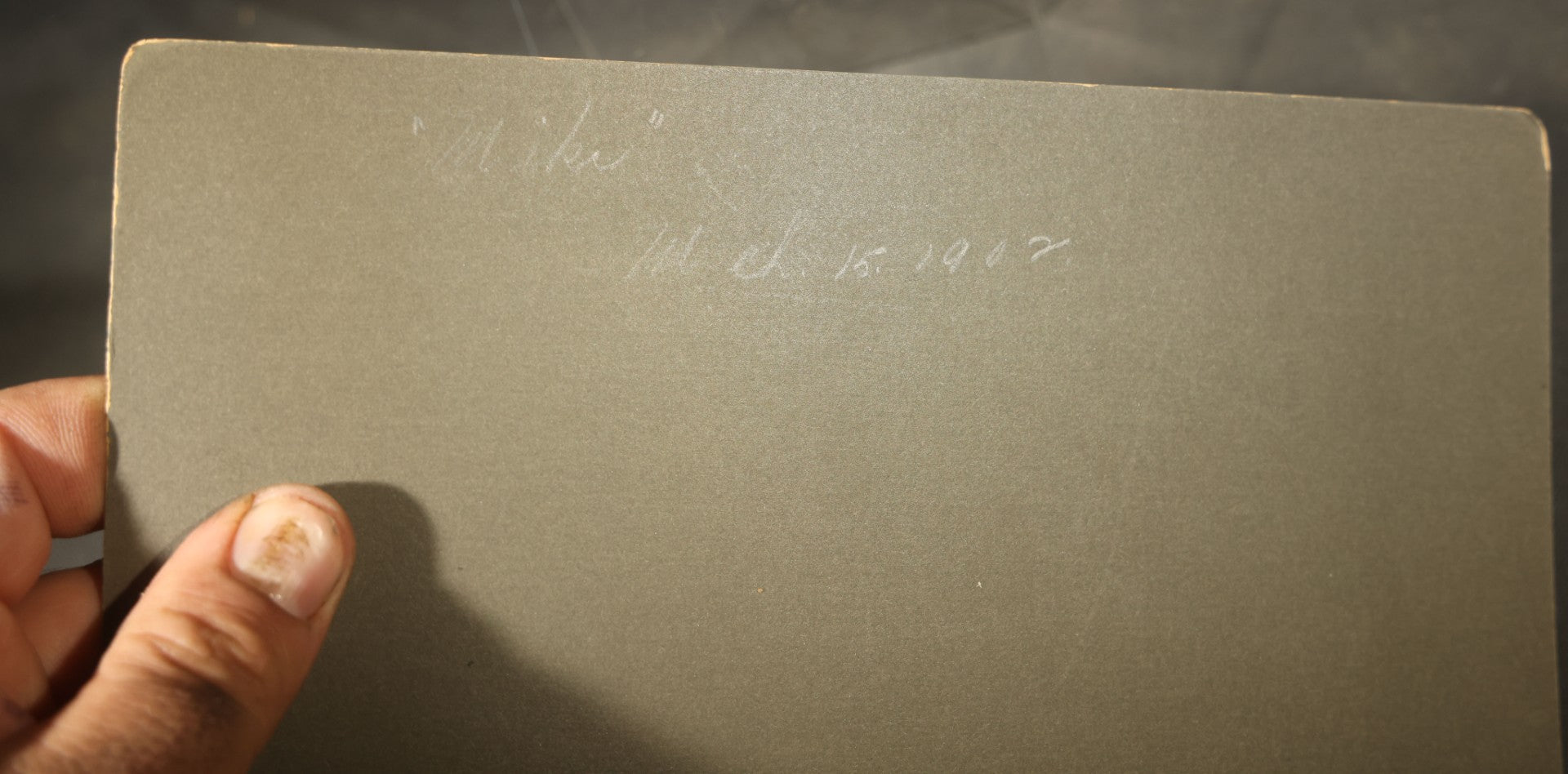 Antique Board-Mounted Photograph of a Woman Chopping Firewood, Inscribed "Mike" on Verso, Dated March 15, 1902