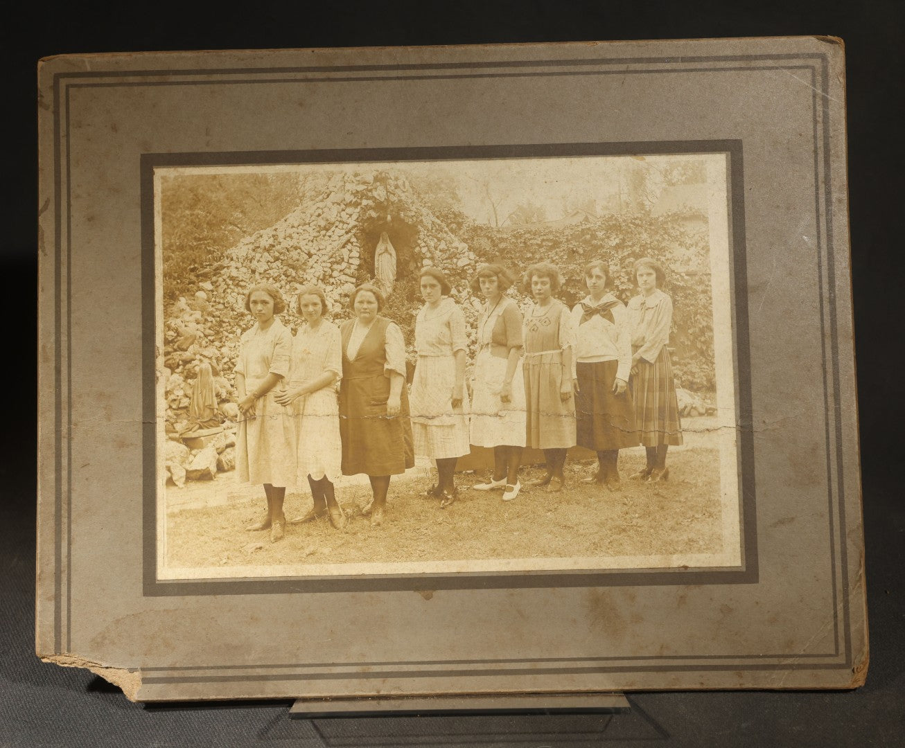 Antique Board-Mounted Photograph of Eight Young Women Posed Before a Religious Grotto with Marian Statue