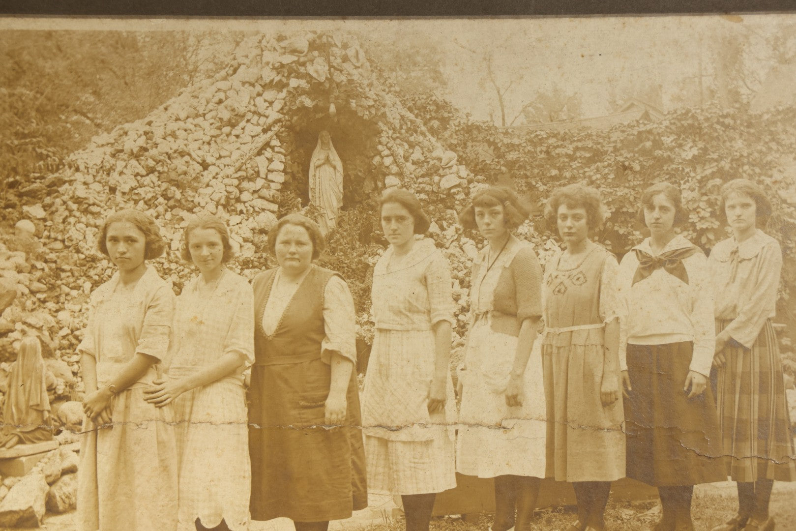 Antique Board-Mounted Photograph of Eight Young Women Posed Before a Religious Grotto with Marian Statue