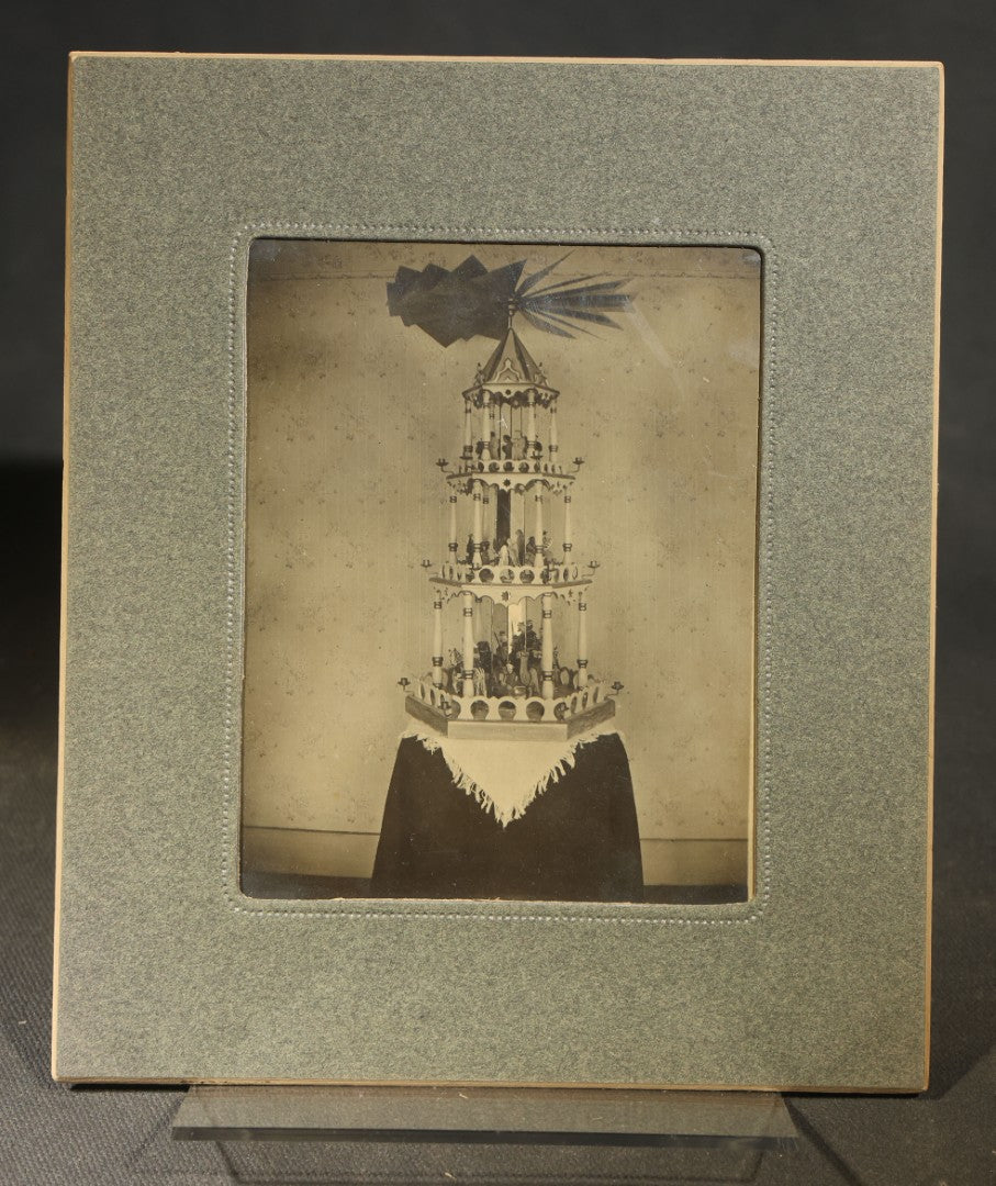 Grouping of Five Antique Board-Mounted Photographs including Sunken Paddle Wheel Steamboat Inscribed "Sunk on Currier Rock 1903," German Christmas Pyramid, and Child with Taxidermy Bird by Nicholas, Bristol, New Hampshire