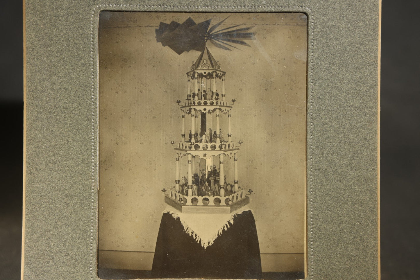 Grouping of Five Antique Board-Mounted Photographs including Sunken Paddle Wheel Steamboat Inscribed "Sunk on Currier Rock 1903," German Christmas Pyramid, and Child with Taxidermy Bird by Nicholas, Bristol, New Hampshire
