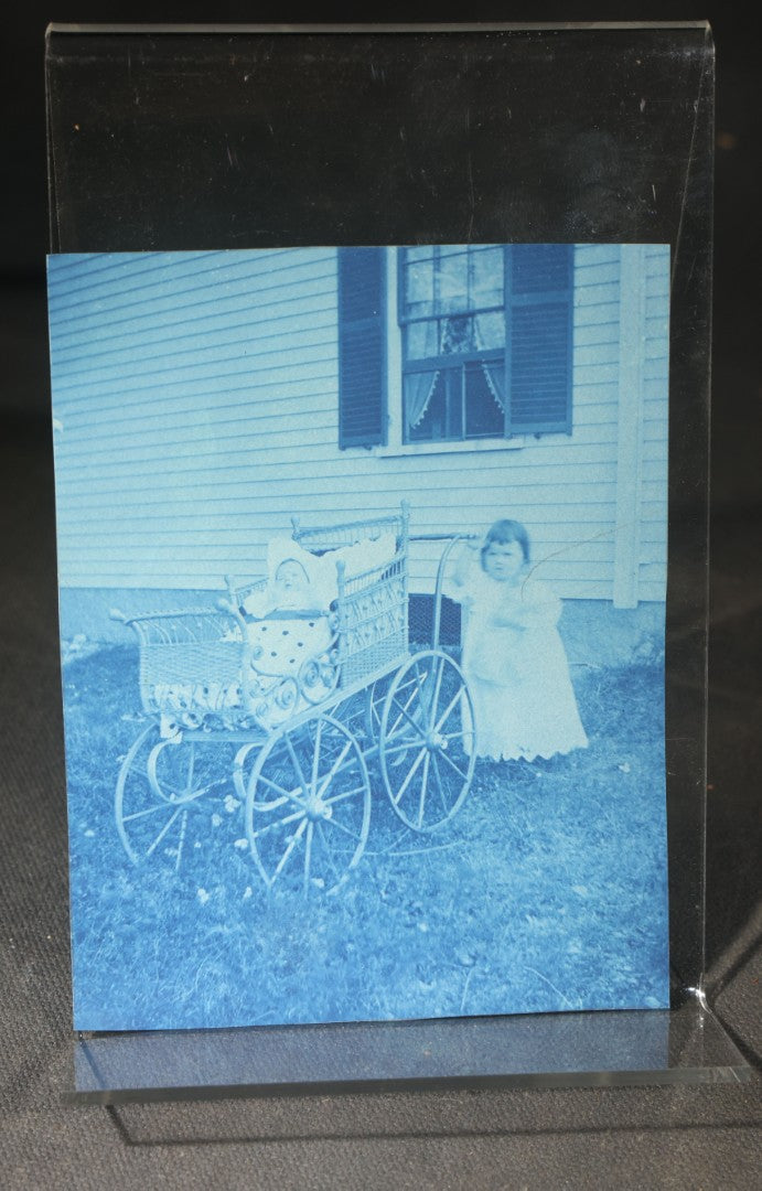 Grouping of 12 Antique Cyanotype Photographs including "Weirs Wreck" Train Derailment, Occupational Newspaper Deliveryman with "The Sun" Cart, Naval Warships, Cyanotype on Birch Bark, Man with Bicycle, and Photo Gallery Interior