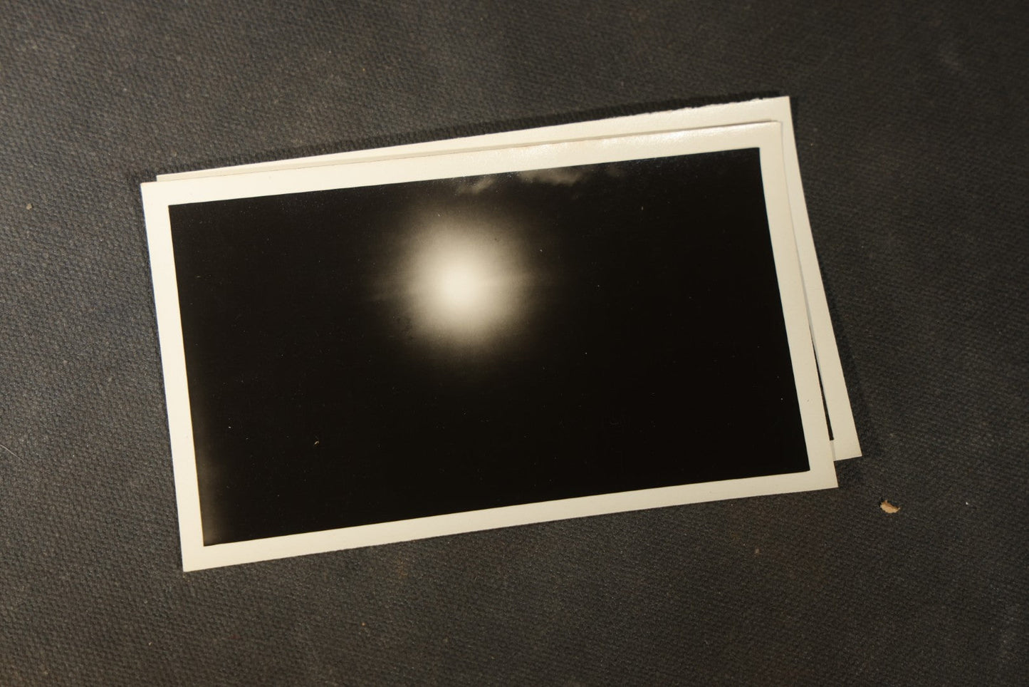 Grouping of 11 Vintage Snapshot Photographs with Negatives of the 1932 Solar Eclipse including Partial and Total Eclipse Phases and Eclipse Viewers with American Flag